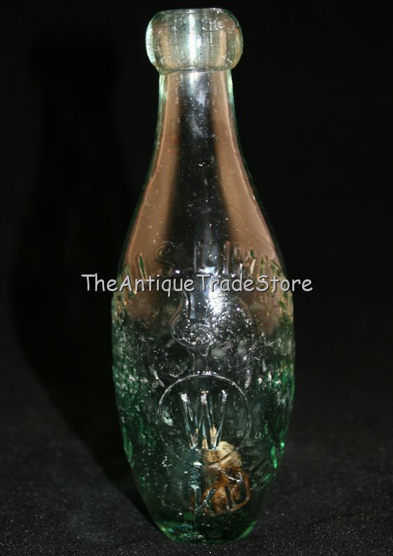 Antique British glass Halls Limited Walkden soda bottle