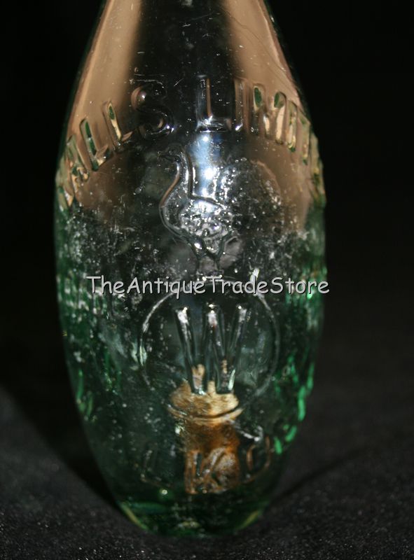 Antique British glass Halls Limited Walkden soda bottle