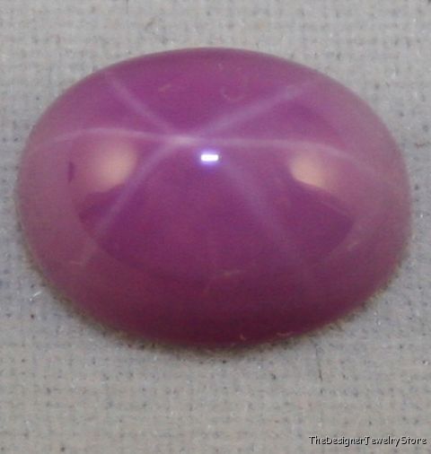 Lab grown Star Ruby 7x9 oval 2.6ct gem cabochon ru9
