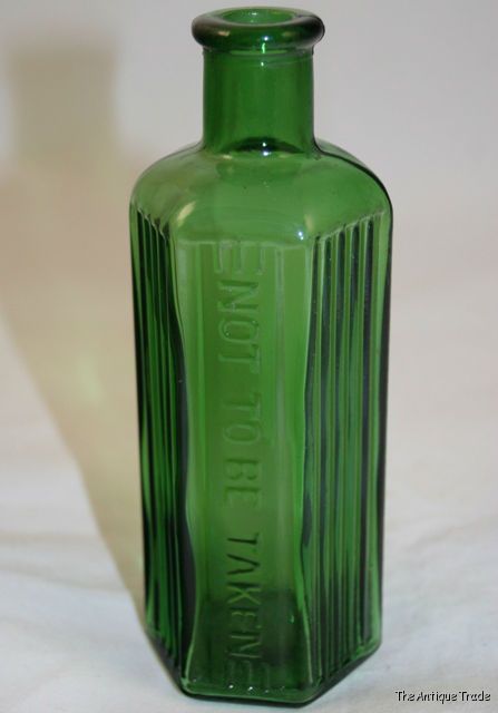 Antique British green glass small poison bottle