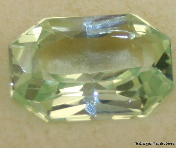 Natural gem green Hiddenite 9.8x14 octagon 6.3ct ku4