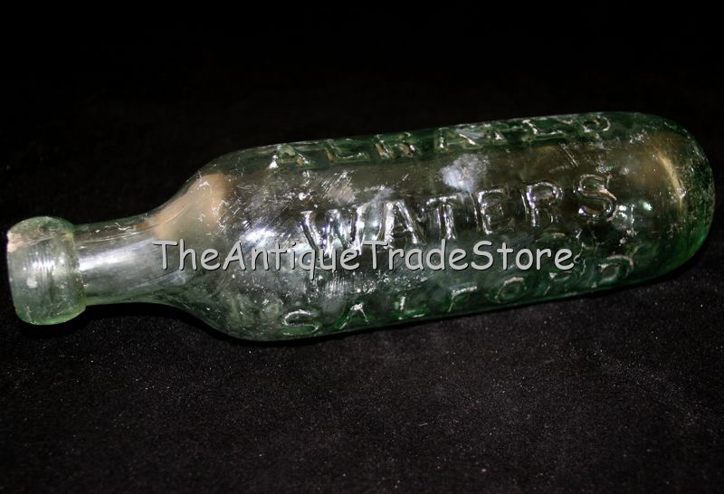 Antique British glass Townsends round base Soda bottle