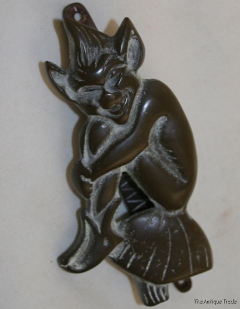 Antique cast bronze Sitting Troll Door Knocker ornament