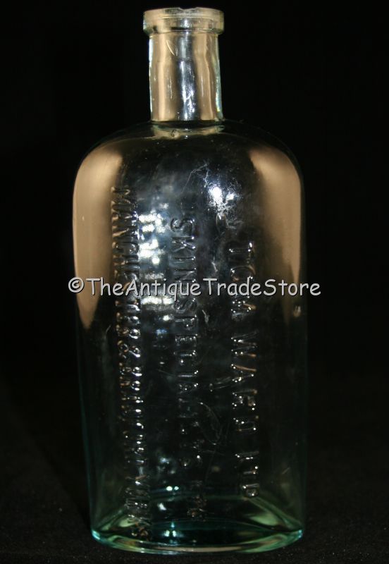 Antique glass Tom Ward Skin Specialists bottle
