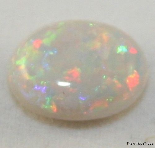 Natural Opal gemstone cabochon AAA 7x10 oval 1.6ct op5