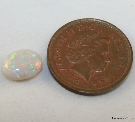 Natural Opal gemstone cabochon AAA 7x10 oval 1.6ct op5