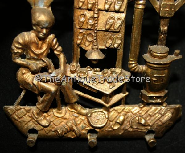 Vintage brass Shoe maker workshop scene Key Rack