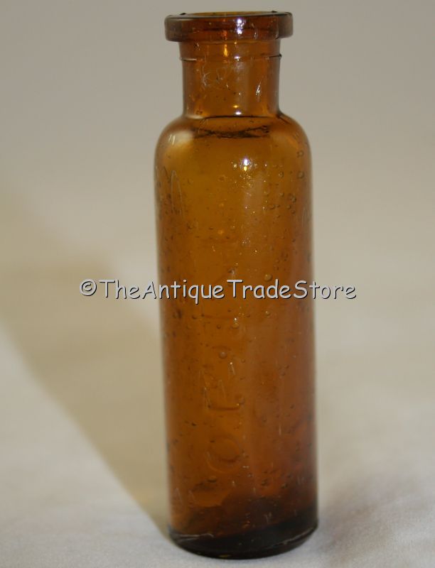 Antique British Amber glass Inecto bottle