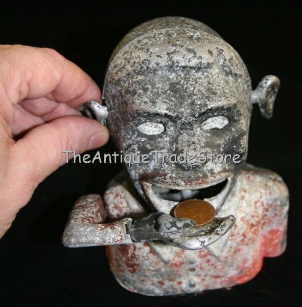 1945 Starkie aluminium Black Man money box made in England