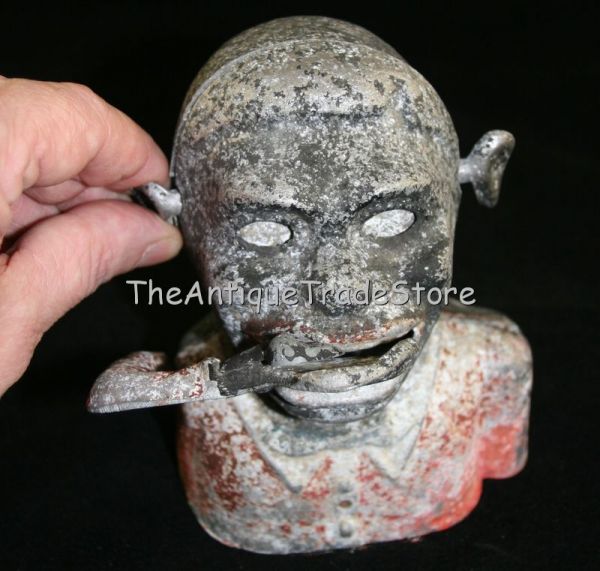 1945 Starkie aluminium Black Man money box made in England