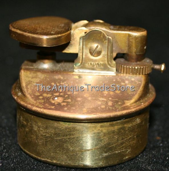 Vintage Japan made cast metal table top lighter