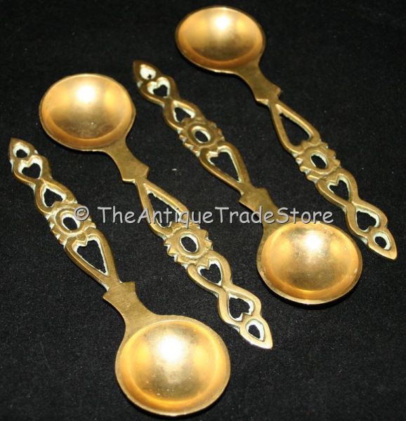 Vintage cast brass set of 4 spoons