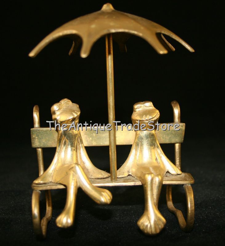 Vintage solid cast brass Two Frogs on bench umbrella