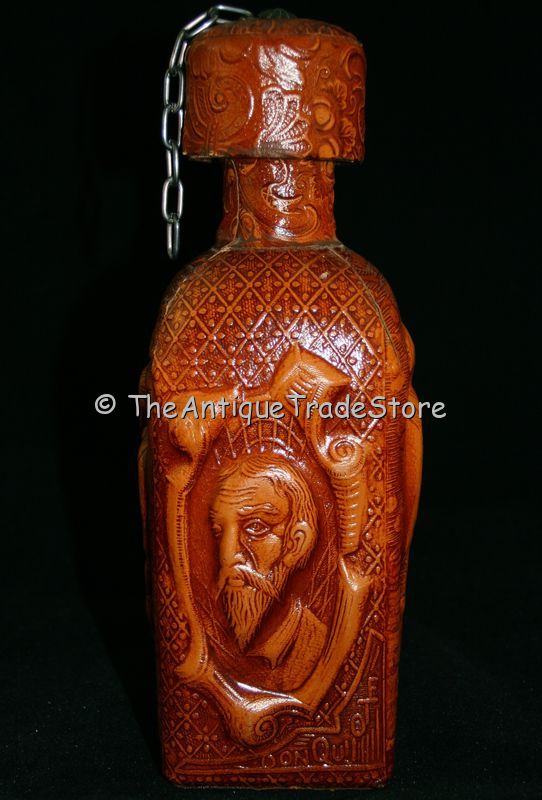 Vintage glass decanter Embossed leather Don Quijote