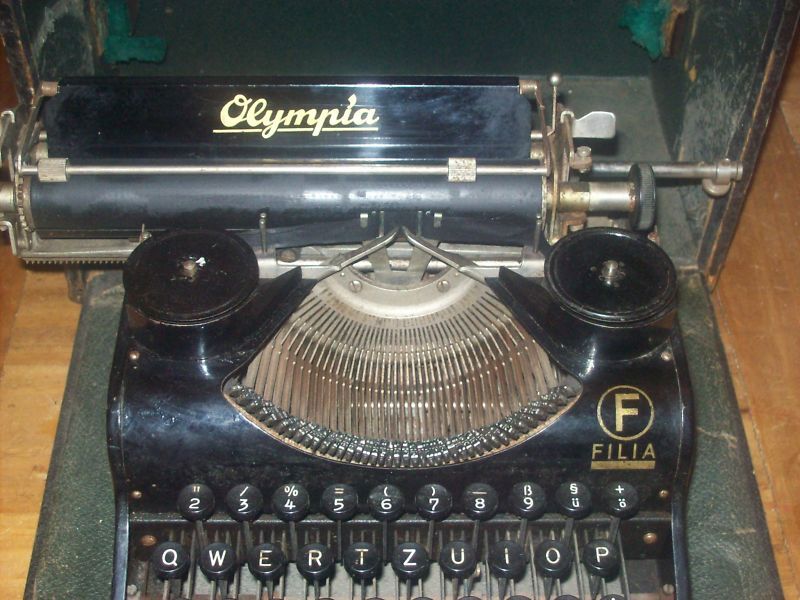 Antique Olympia Filia Typewriter Close up Logo