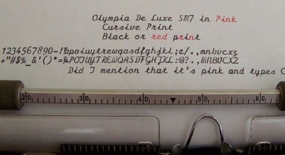 Olympia DeLuxe SM7 Cursive Font Sample