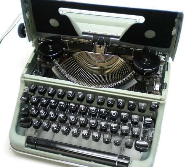 Olympia SM4 Script/Cursive Portable Manual Typewriter