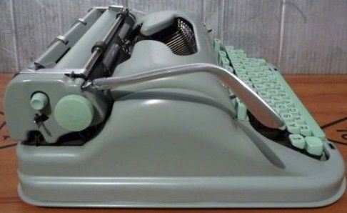 Hermes 3000 Cursive Fontface Typewriter Side View