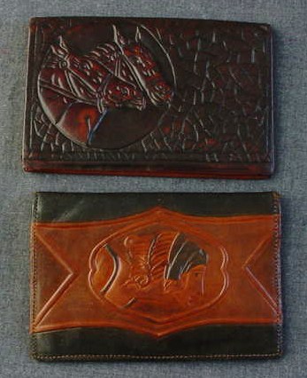 2 ANTIQUE EMBOSSED GENUINE LEATHER WALLETS