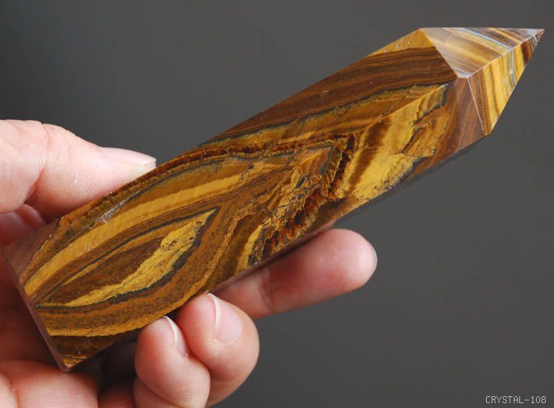 natural gold tiger eye crystal point chatoyant